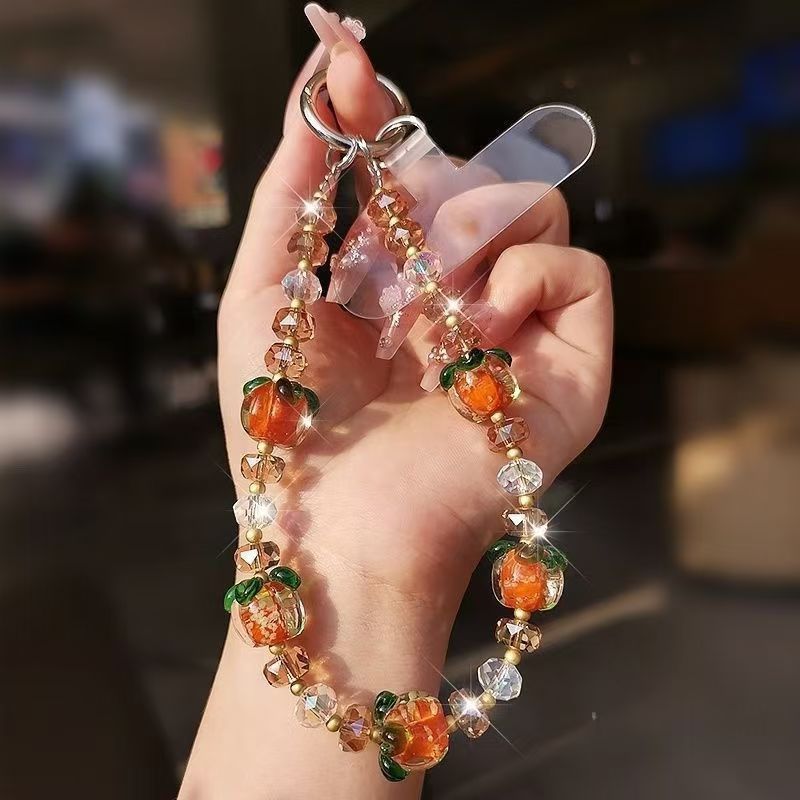 新款水晶珠串柿子手机挂链创意汽车钥匙链时尚网红包包装挂饰批发