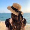 夏季编织遮阳帽女休闲海边沙滩遮阳防晒帽蝴蝶结毛边平顶草帽