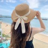 夏季编织遮阳帽女休闲海边沙滩遮阳防晒帽蝴蝶结毛边平顶草帽