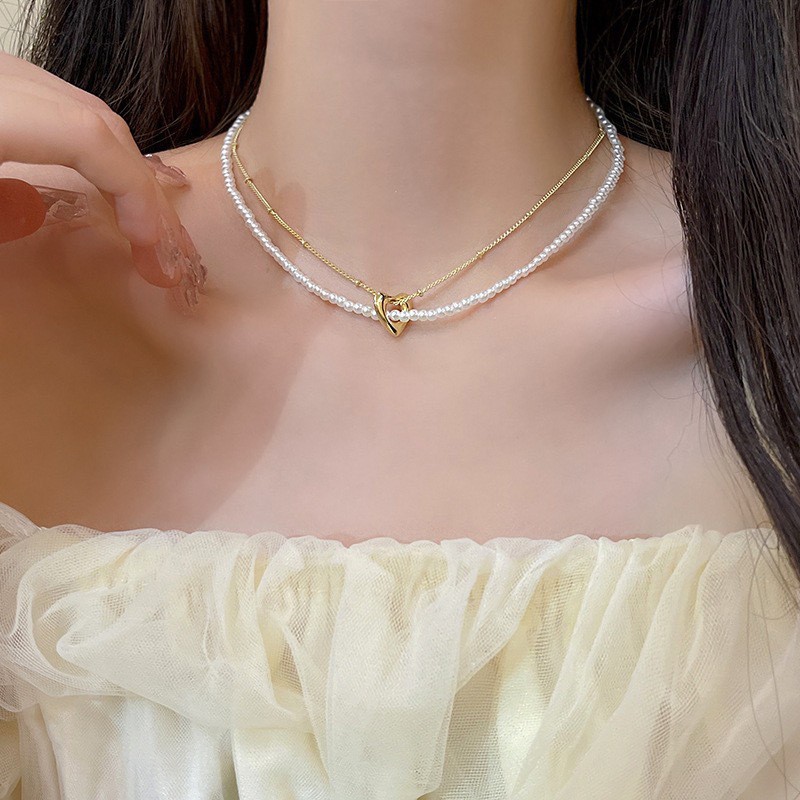 温柔蝴蝶珍珠项链配裙子女轻奢小众高级感锁骨链2024新款颈链配饰